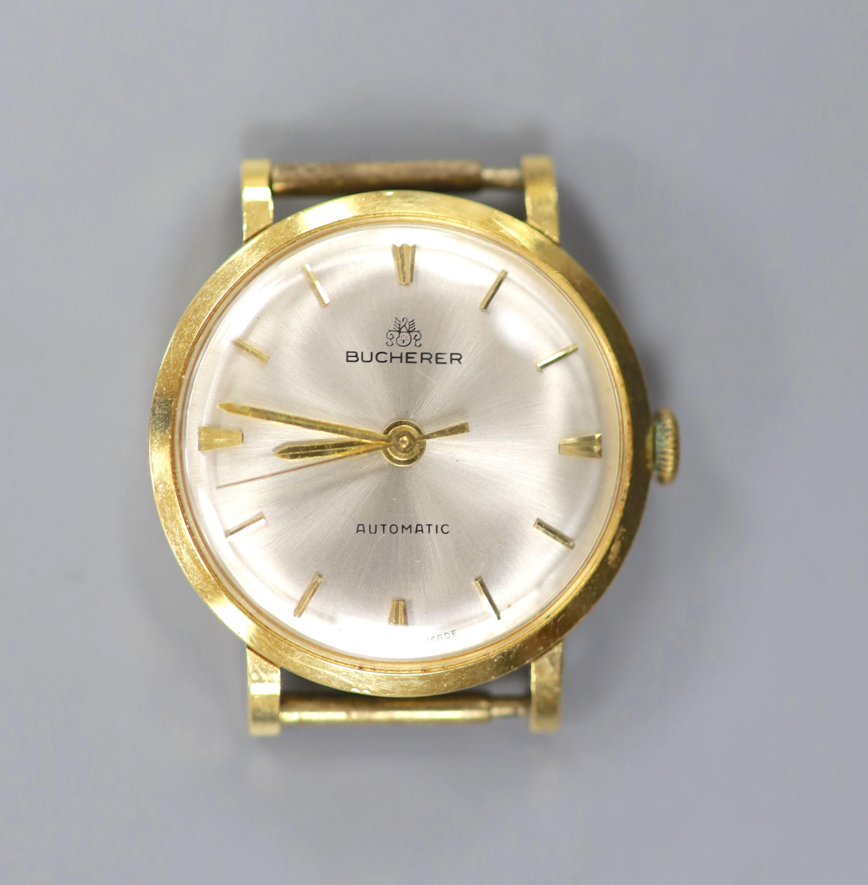 A lady's modern 18k Bucherer automatic wrist watch, no strap, case diameter 26mm, gross weight 16.4 grams.